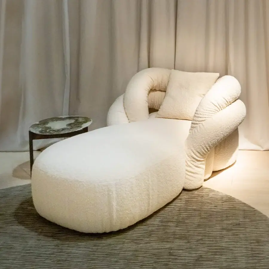 Exceptional Rugiano Abbraccio chaise lounge crafted in creamy off-white textured bouclé fabric with bronzed brass details