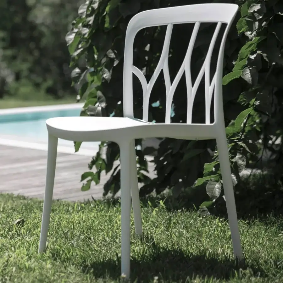 Distinctive Bontempi Galaxy chair with organically-shaped backrest crafted in uniformly white synthetic material with smooth matte finish