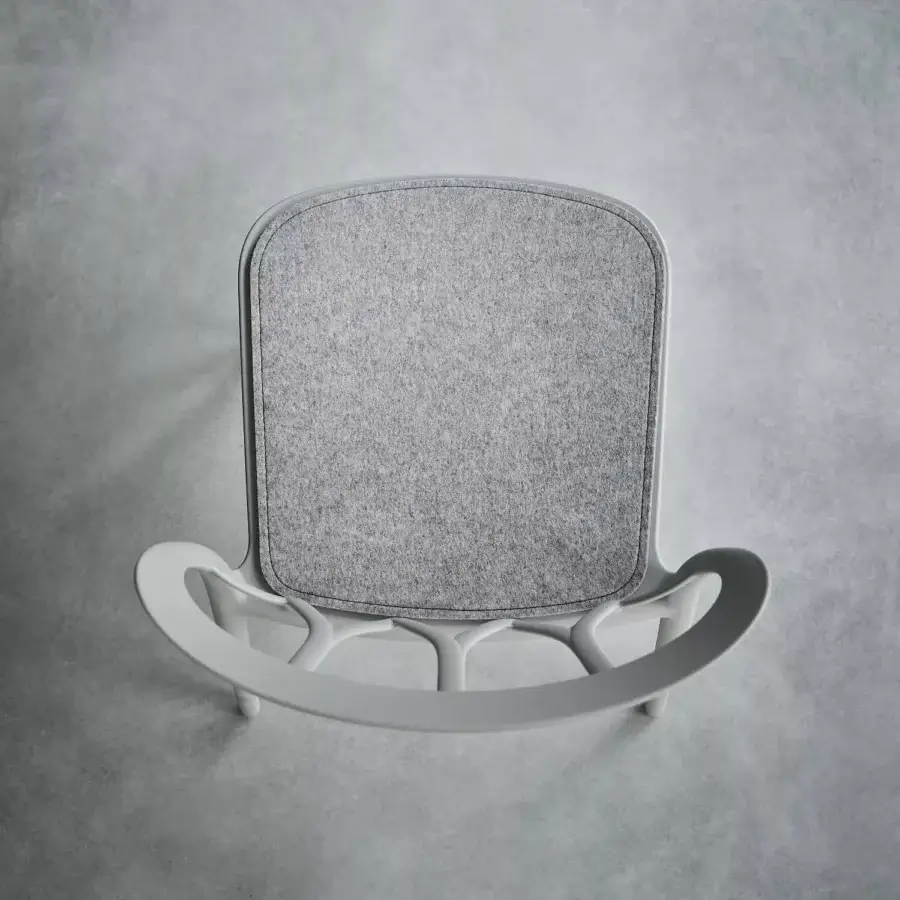 Exceptional Bontempi Galaxy chair with organically curved form and integrated natural wool pad in muted gray with matte finish