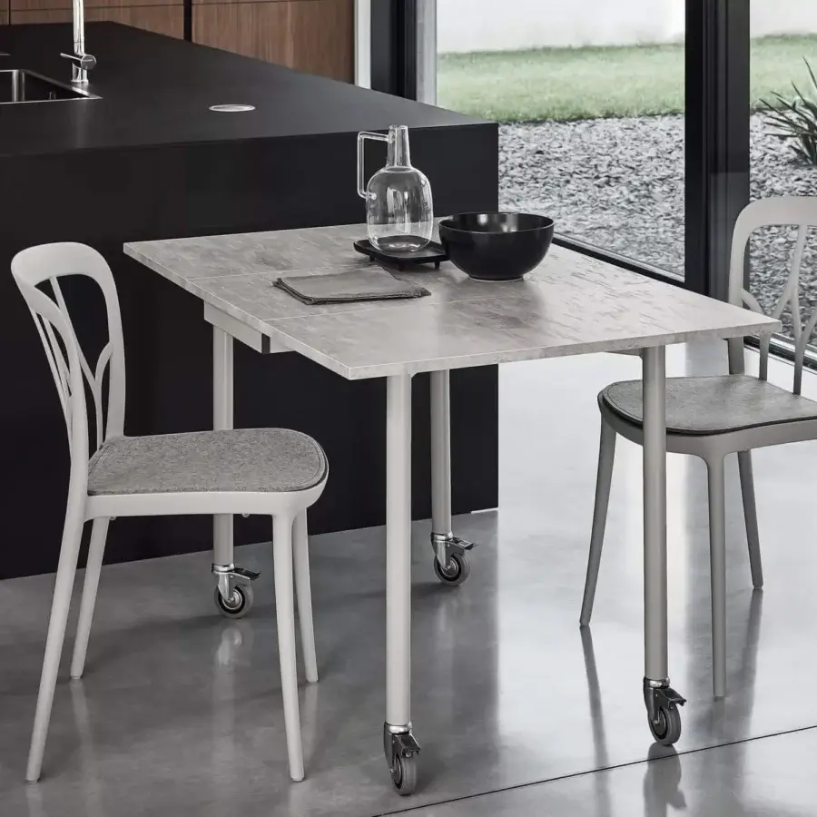 Elegant Bontempi Galaxy chair with vertically ribbed backrest crafted in white synthetic material and light gray natural wool pad