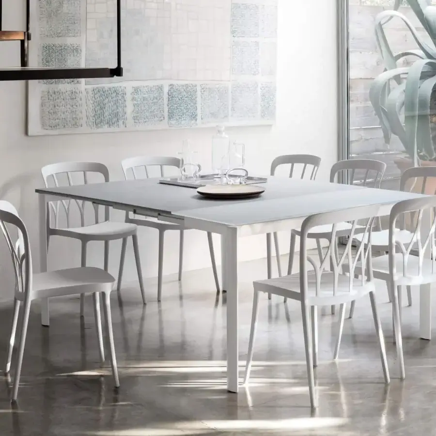 Elegant Bontempi Galaxy chair with sleek molded form and curved silhouette in matte light gray synthetic material