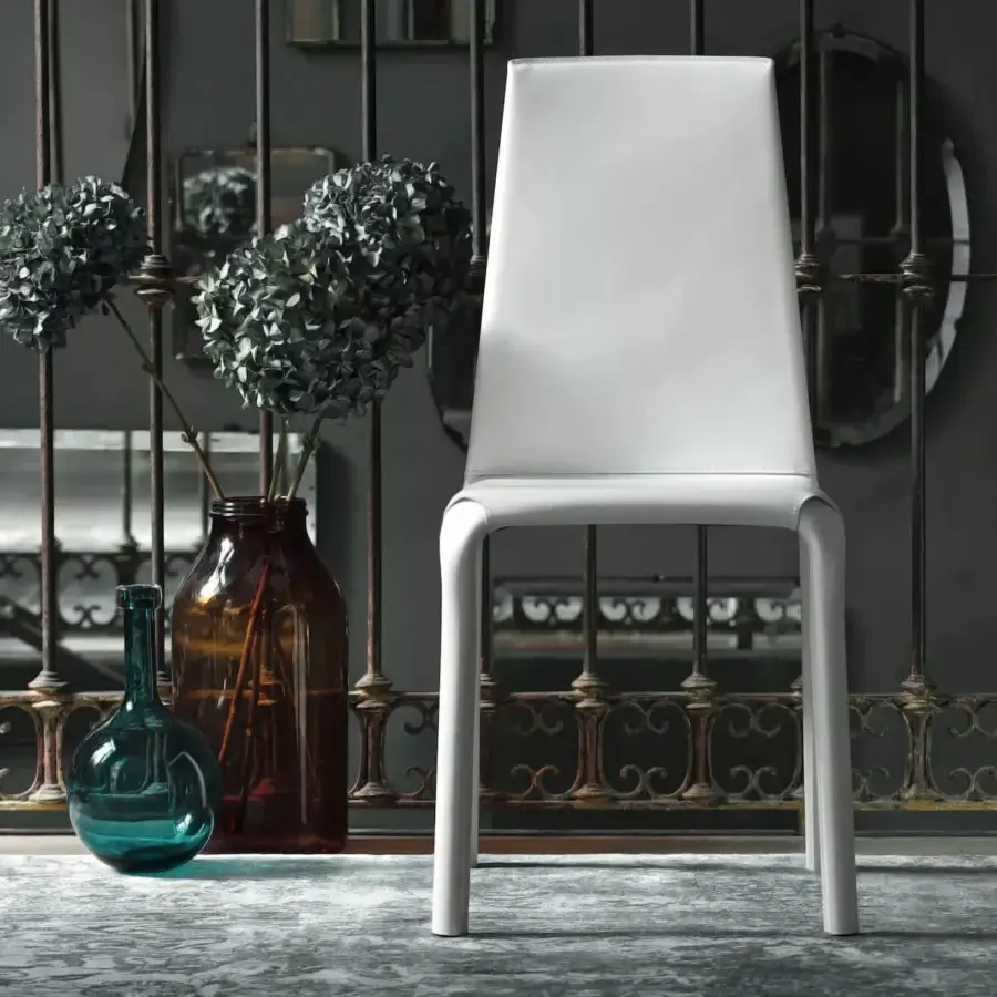 Exceptional Bontempi Alice chair crafted in bright white hide leather with a smooth matte finish and ergonomic curves