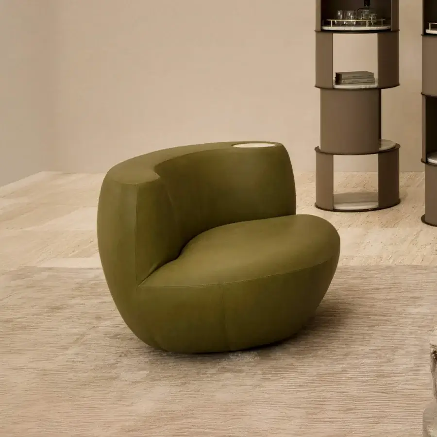 Exclusive Rugiano Rafael lounge chair with fluid silhouette upholstered in matte olive green leather with marble indentation