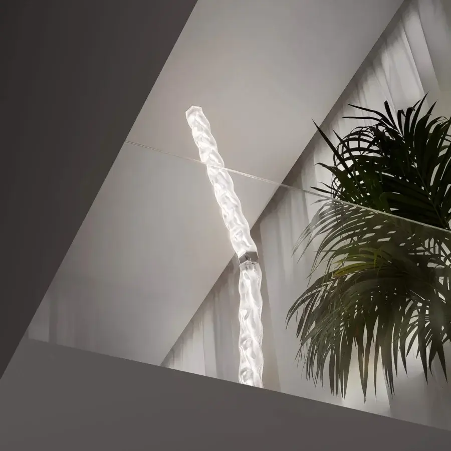 Distinguished Slamp Hugo floor lamp embodying sculptural form with bright white Lentiflex material and invisible steel core