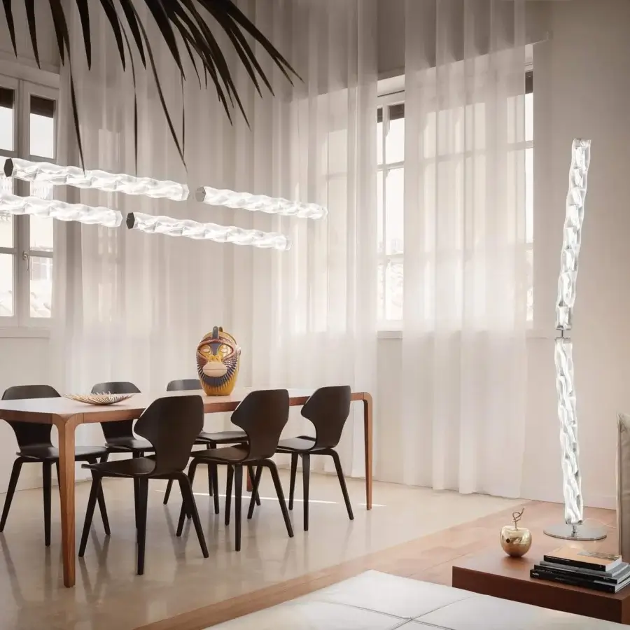 Superior Slamp Hugo floor lamp embodying flowing silhouette with white Lentiflex material and invisible steel structure