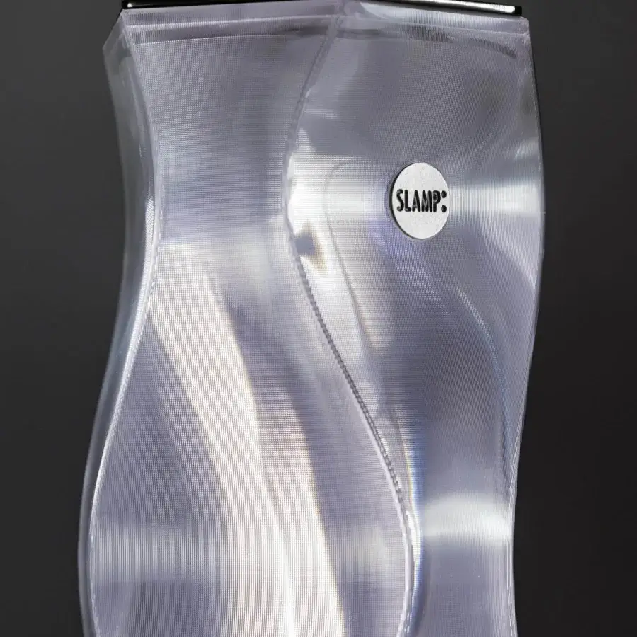 Superior Slamp Hugo floor lamp embodying harmonious form with translucent Lentiflex® and glossy finish