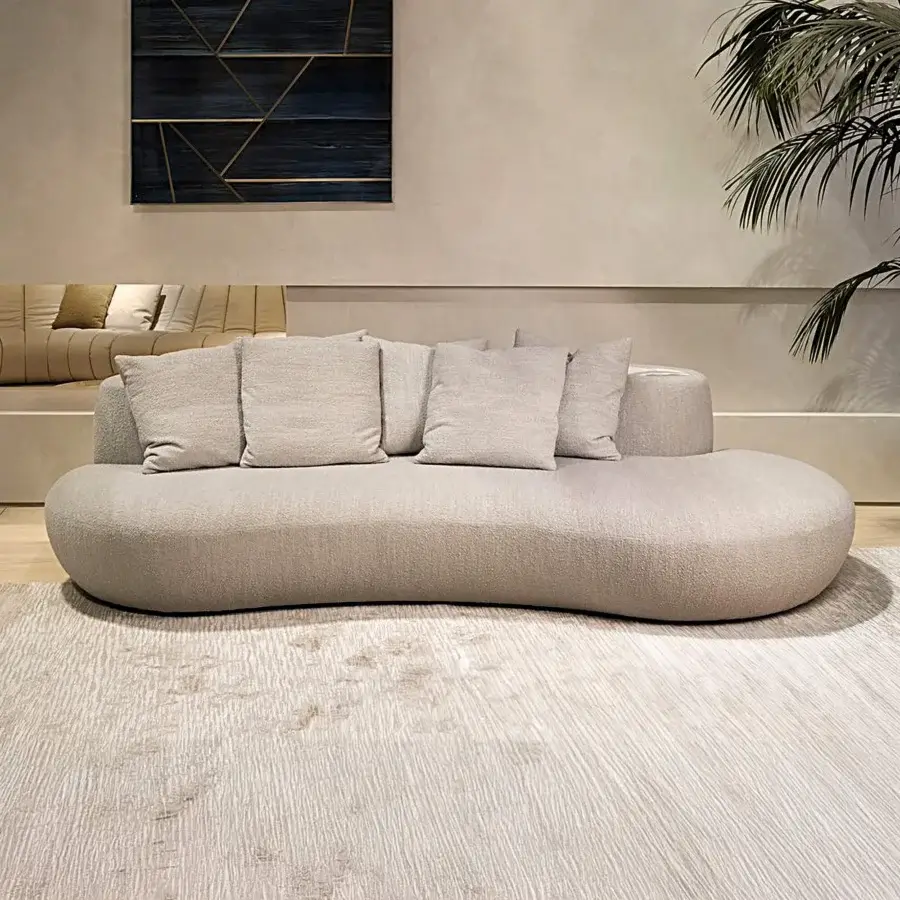 Exceptional Rugiano Rafael sofa with curved organic form and neutral beige textile upholstery in matte finish