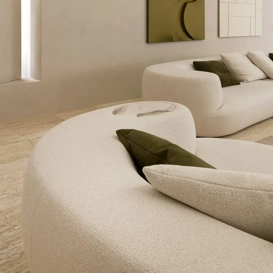 Superior Rugiano Rafael sofa with curved organic form and off-white textured bouclé upholstery built with a marble finish