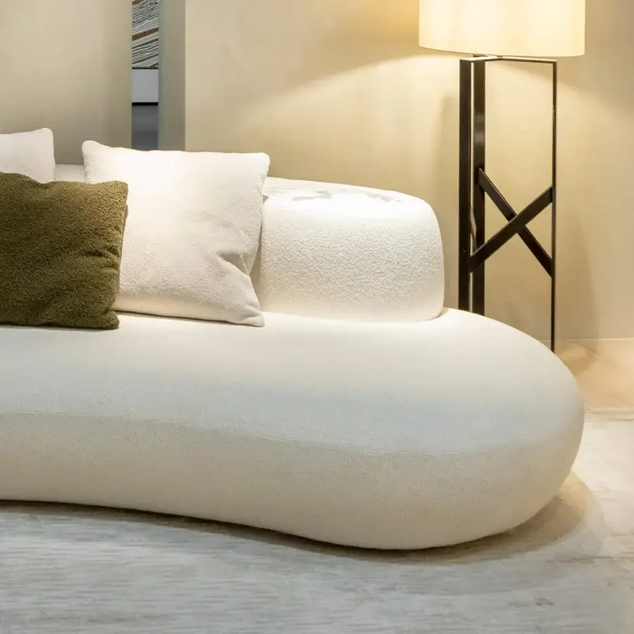 Lavish Rugiano Rafael sectional with integrated marble detail and off-white textured matte fabric upholstery