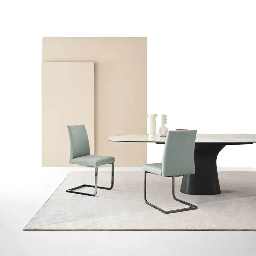 Captivating Bontempi Hisa chair with grayish-green textile upholstery and a matte black cantilevered metal base