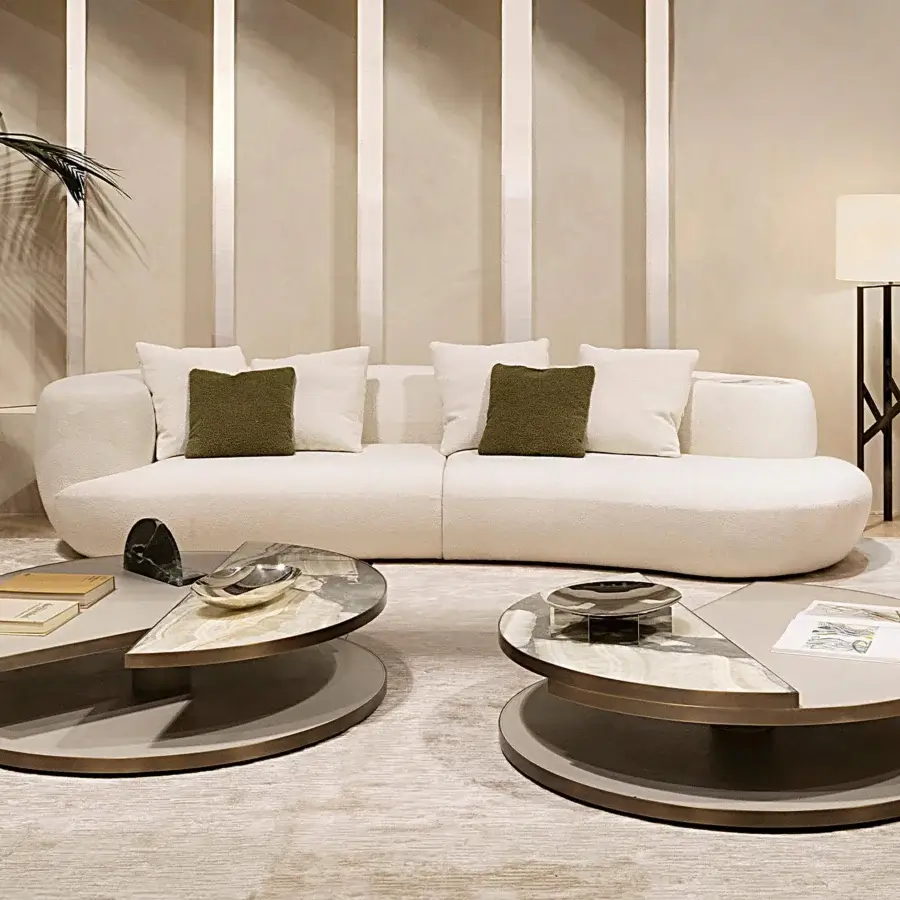 Exclusive Rugiano Rafael sectional with off-white textured fabric upholstery and Calacatta Gold Marble detailing