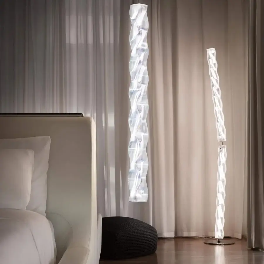 Innovative Slamp Hugo suspension lamp in white Lentiflex® diffuser casting a water reflection effect with integrated LED technology
