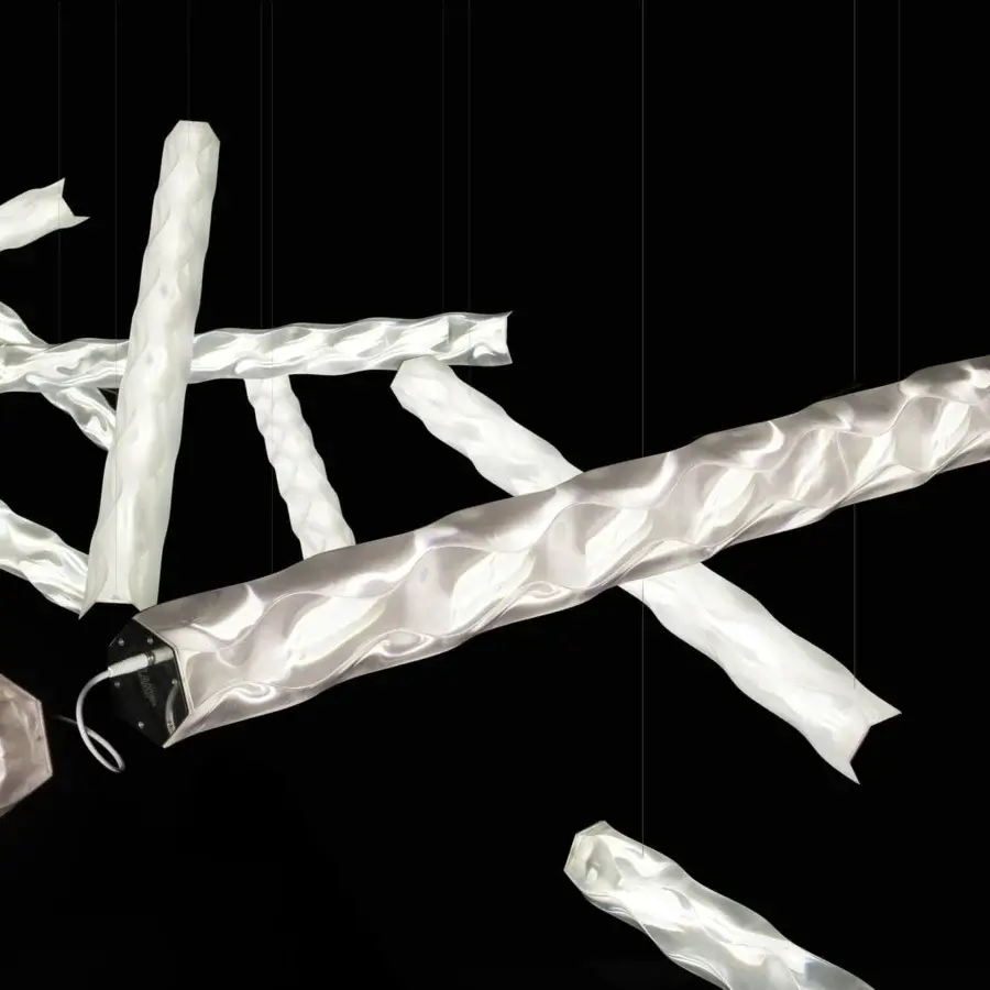 Distinguished Slamp Hugo architectural suspension lamp in bright white Lentiflex® with a pearlescent finish creating a water reflection effect