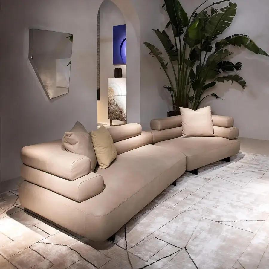 Distinguished Rugiano Bali sectional with low silhouette upholstered in luxurious beige textile and bronzed brass accents