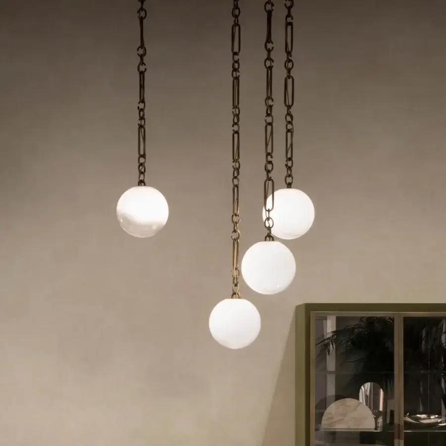 Distinguished Rugiano Collier suspension lamp with spherical white-glass diffusers and warm bronzed brass finish crafted in Italy