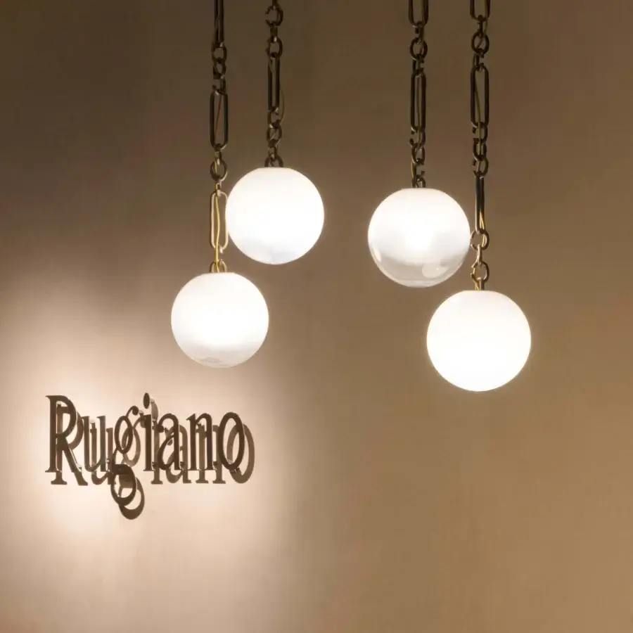 Captivating Rugiano Collier suspension lamp with spherical white-glass diffusers and interconnected bronzed brass chain links