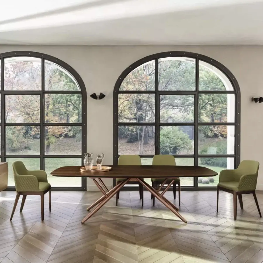 Elegant Bontempi Margot chair with muted green textile and smooth satin wood frame embodies contemporary Italian design
