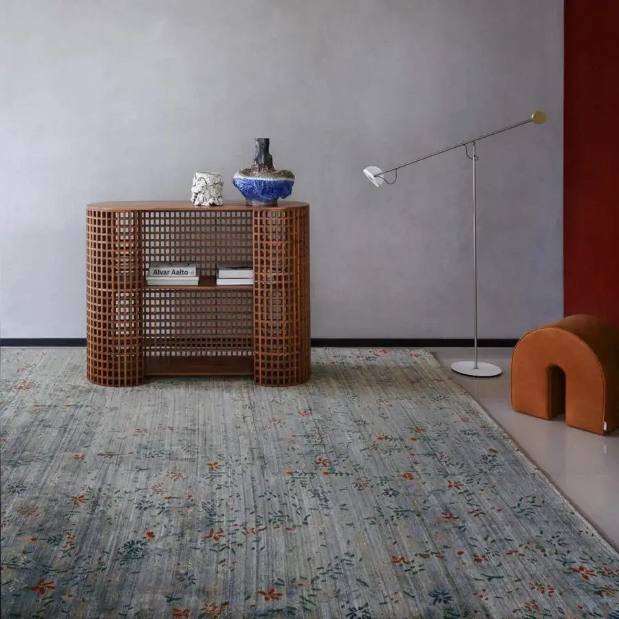 Lavish Amini Giardino rug with densely patterned florals in grey and blue, crafted with wool and viscose, finished with a hand-washed technique