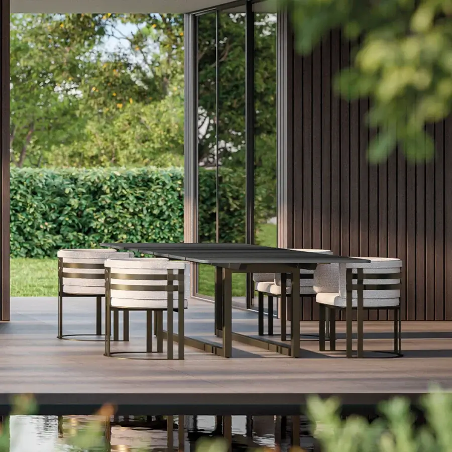 Superior Rugiano Mirage table crafted in light gray Marble with a dark matte Outdoor Bronze Steel frame