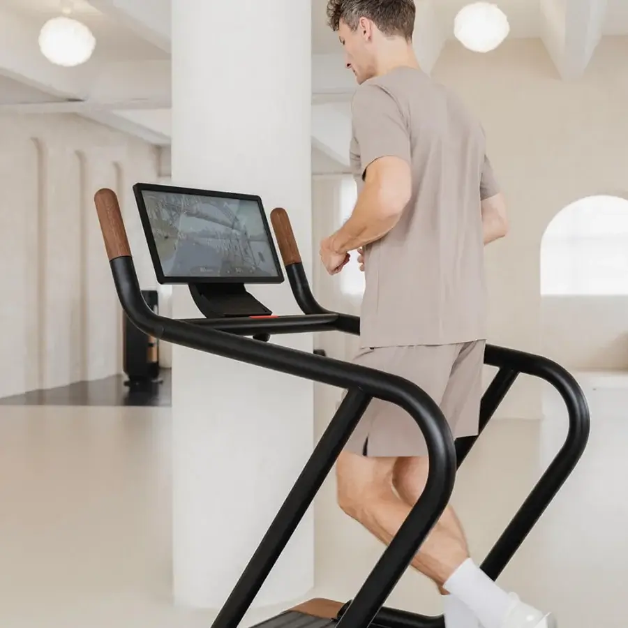 Distinguished NOHRD Citius treadmill crafted from fine woods and precision metal with a matte black finish and smooth satin grain