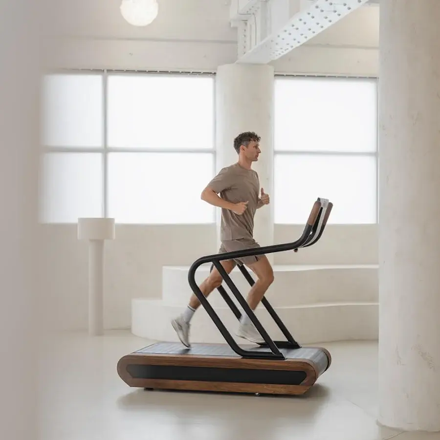 Elegant NOHRD Citius treadmill crafted from fine wood with a satin finish and matte black metal frame