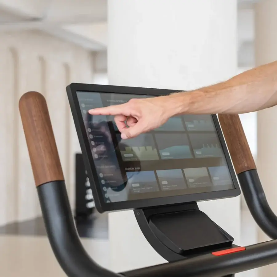 Elegant NOHRD Citius treadmill with fine woods and precision components in a matte black finish