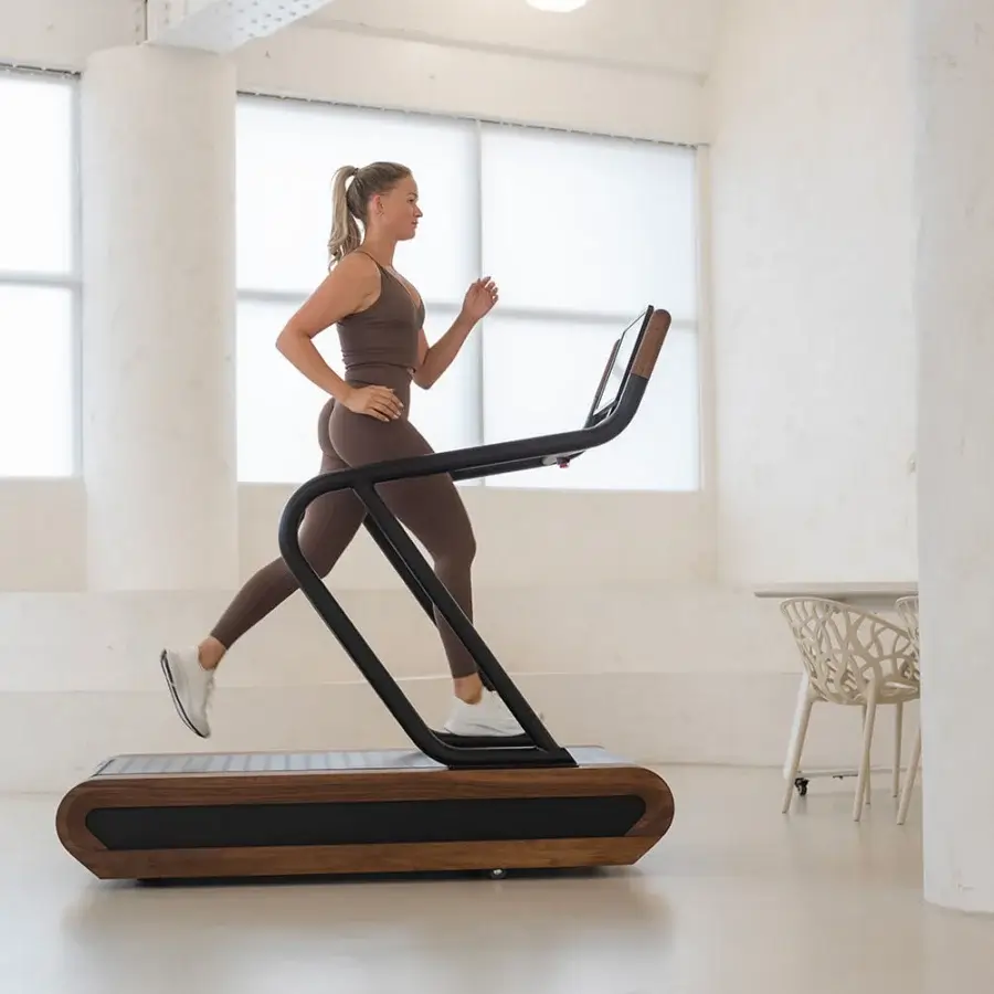 Exceptional NOHRD Citius treadmill built with warm brown wood grain and sleek matte black metal components