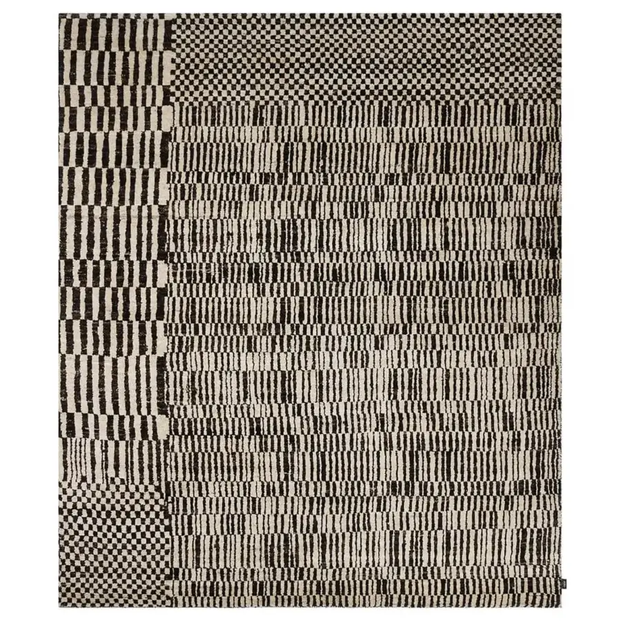 Remarkable Amini One of a Kind rug hand-knotted in India with black and creamy off-white wools and a carved finish