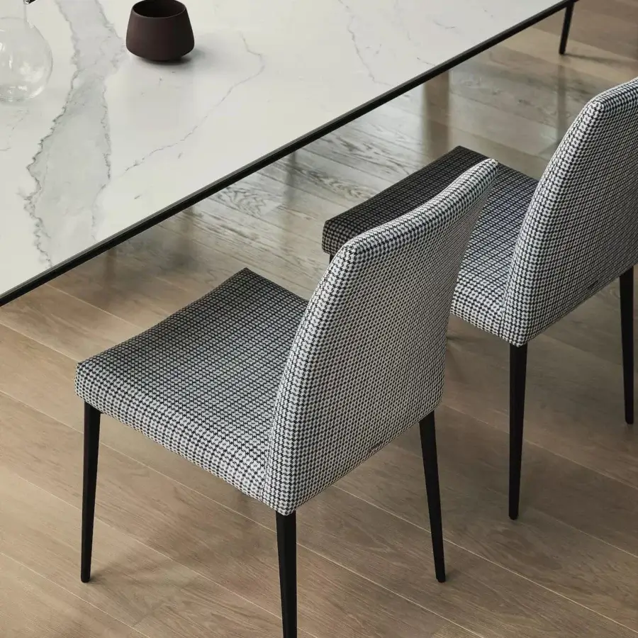 Distinguished Bontempi Mila chair with black and white houndstooth textile upholstery and matte black metal frame