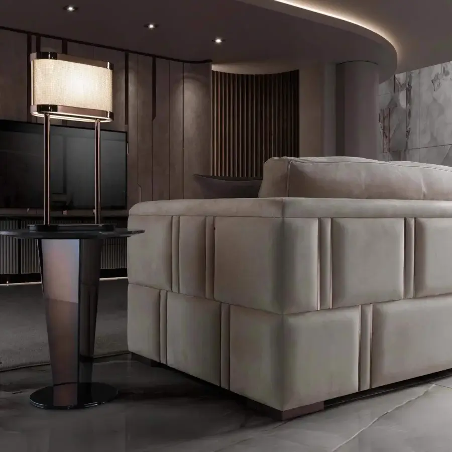 Elegant DV Home Collection Stanley side table with sleek stainless steel column and circular marble top in black finish