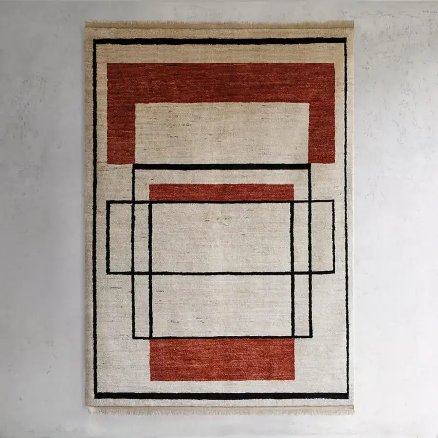 Exceptional Amini Collective rug crafted from Afghanistan wool with minimalist geometric design and hand-washed carved texture