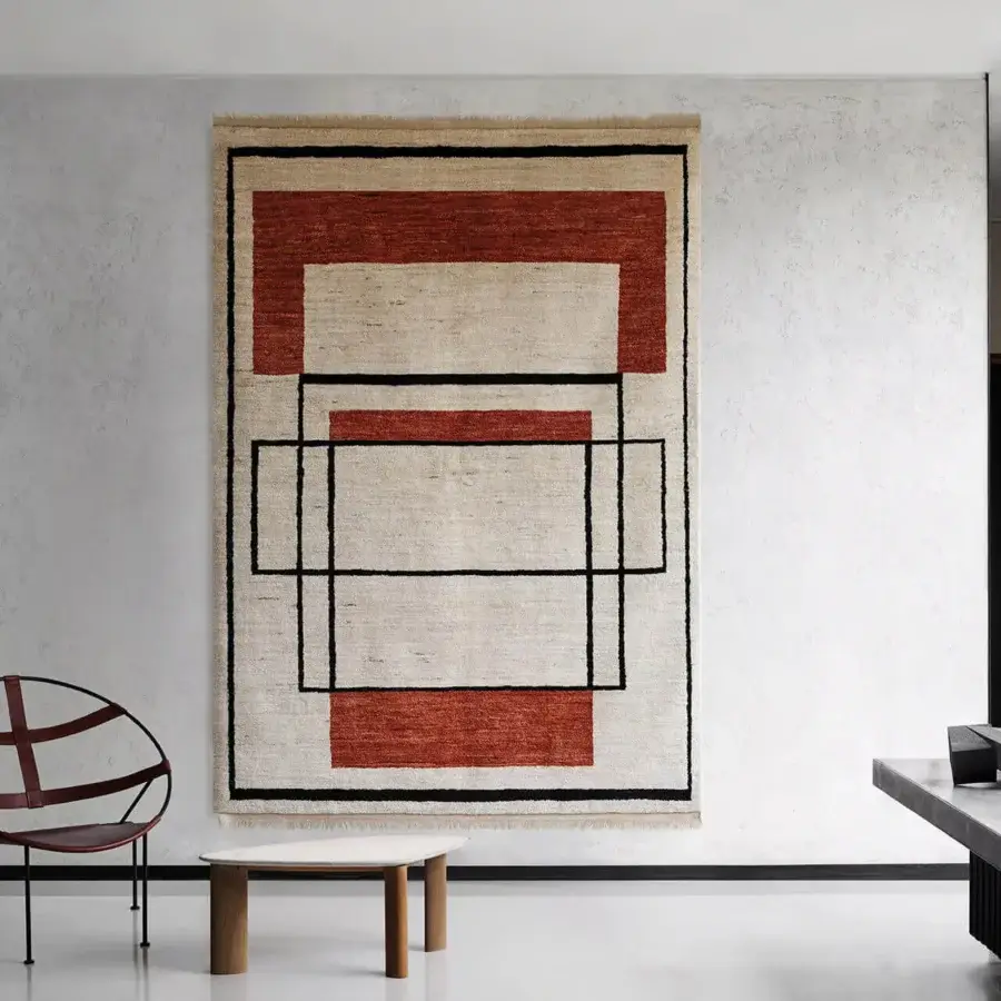Distinguished Amini Collective rug hand-knotted in Afghanistan wool with a symmetrical color-blocked pattern and hand-washed finish