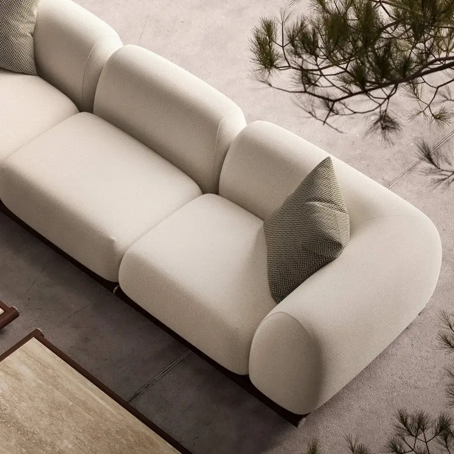 Captivating Rugiano Amalfi sofa with warm stained mahogany, chrome details, and textured matte light beige fabric