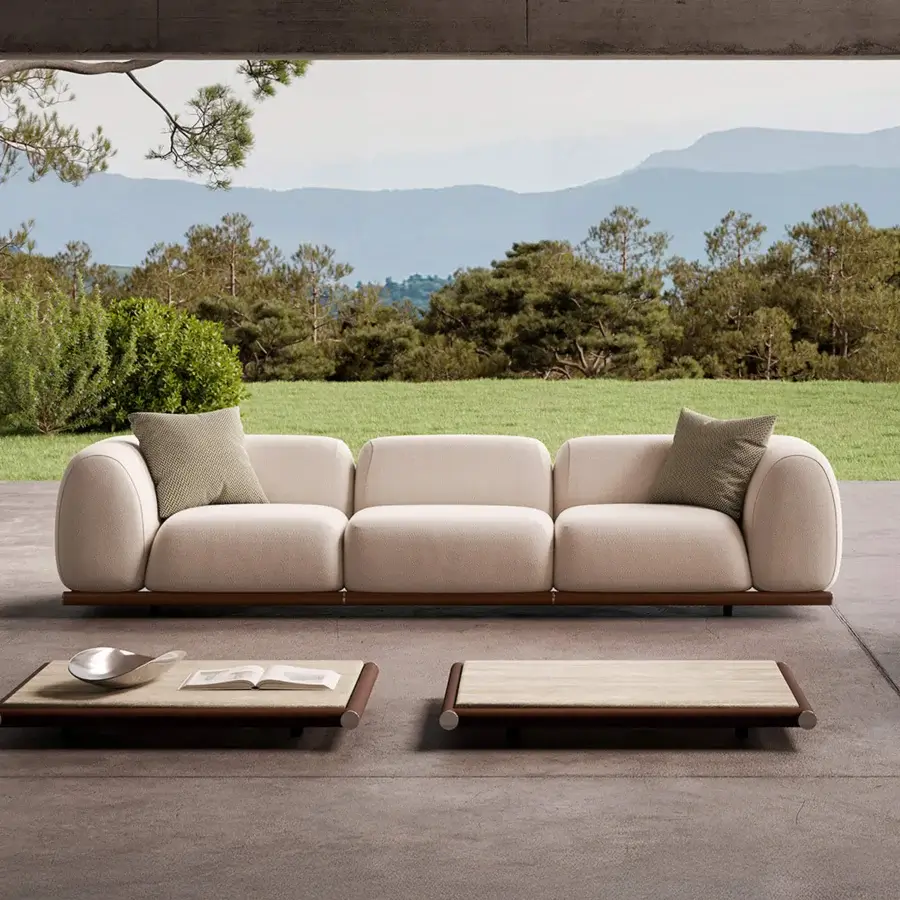 Exclusive Rugiano Amalfi sofa with stained mahogany, chrome details, and light beige outdoor fabric upholstery