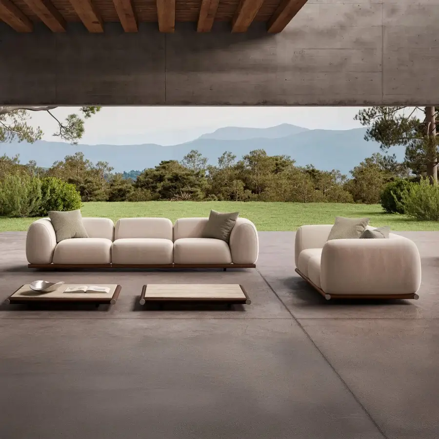 Superior Rugiano Amalfi sofa with stained mahogany, chrome details, and durable light beige outdoor fabric