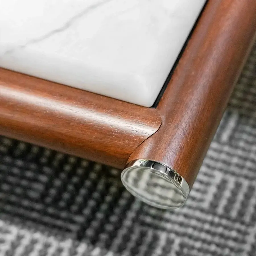 Sophisticated Rugiano Amalfi coffee table with a marble top and stained mahogany wood frame in satin finish