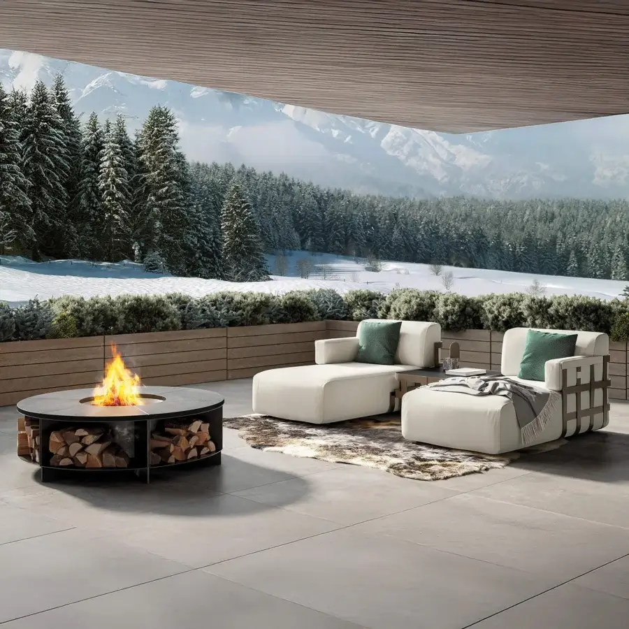 Distinguished Rugiano fireplace crafted in black-painted metal with refined stone materiality exhibiting a cylindrical form