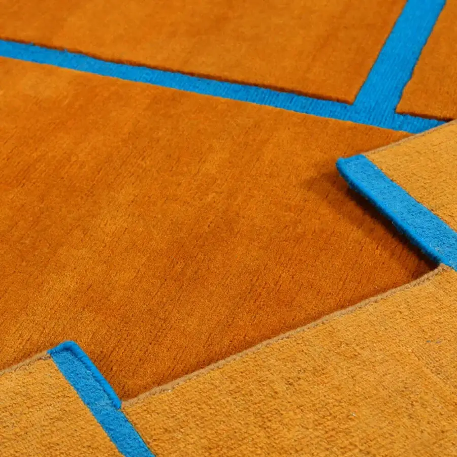 Distinguished Amini Campiture rug hand-knotted in India with vibrant bright orange and pop blue New Zealand wool and pile loop cut finish