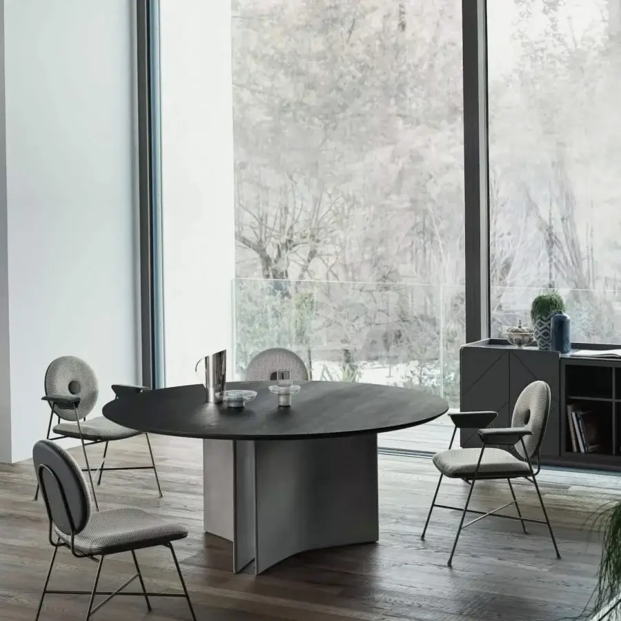 Distinctive Bontempi Penelope chair upholstered in speckled gray textile with a matte light gray molded shell and dark-toned metal frame