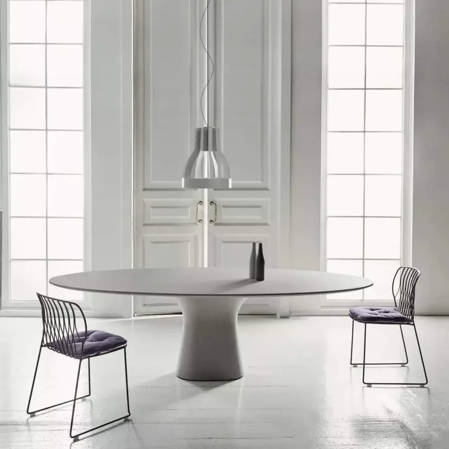 Exclusive Bontempi Freak chair in dark matte metal with muted purple textile upholstery and stackable design