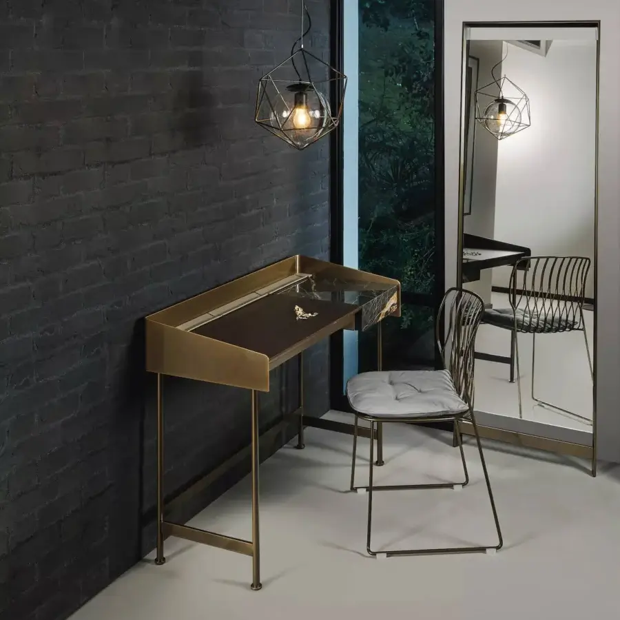 Elegant Bontempi Freak chair with satin gold-tone metal framing and light gray upholstery offering a stackable design