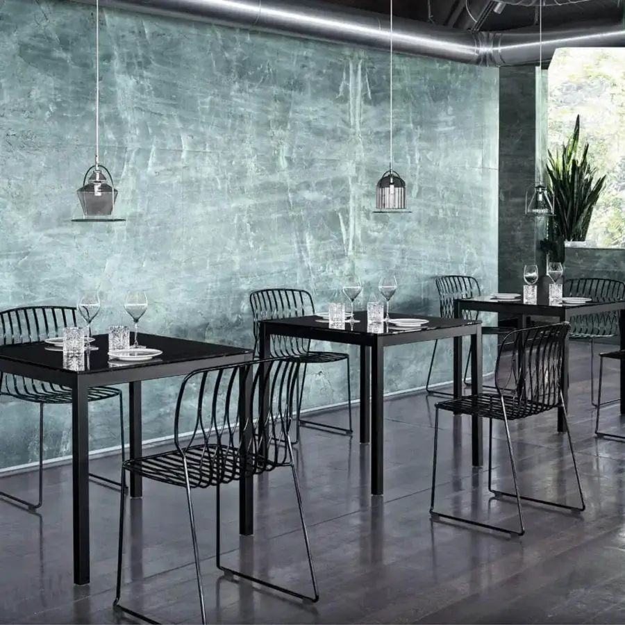 Superior Bontempi Freak chair crafted in matte black metal with continuous lines and a stackable design