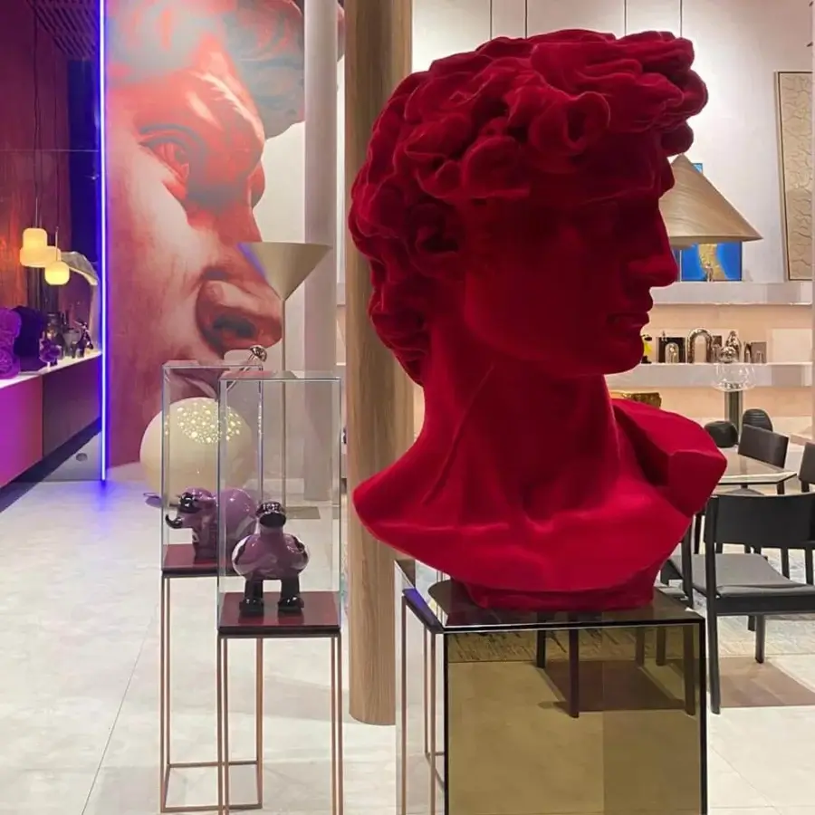 Exceptional Adriani e Rossi David sculpture crafted in ceramic powders with a deep red velvet finish