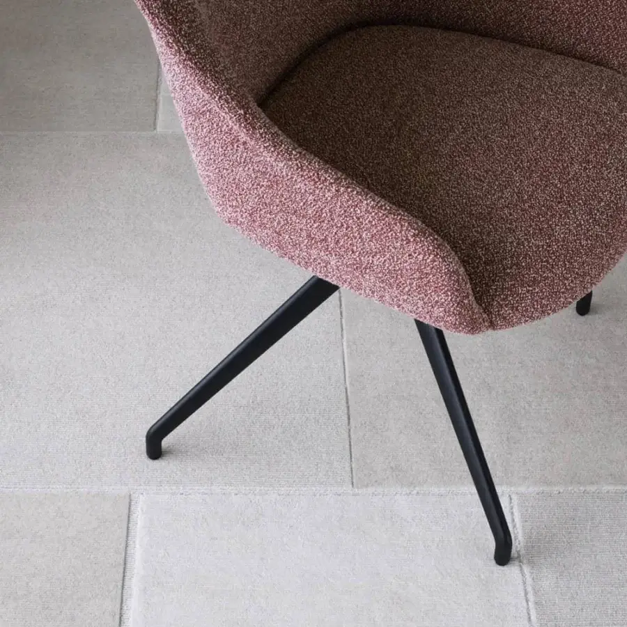Superior Potocco Lyz chair with organic form upholstered in mottled red and brown textile and sleek matte black metal base