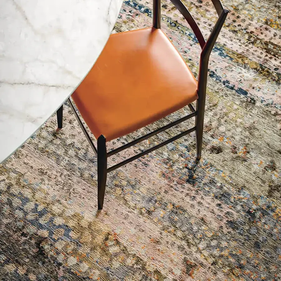 Exquisite Amini Flora rug crafted from pure silk with a contemporary abstract floral design in muted beige, gray, and blue tones