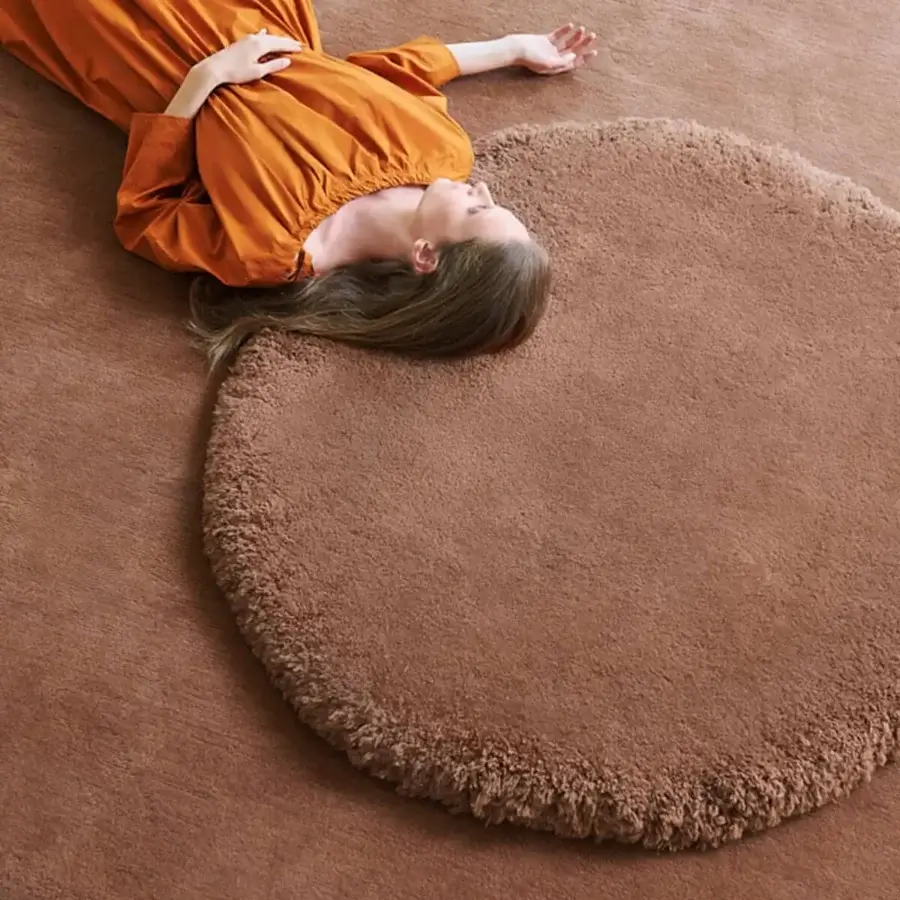 Exceptional Amini Ciclopi-Isola rug hand-knotted in pure organic wool with a subtly shaggy terra tone surface