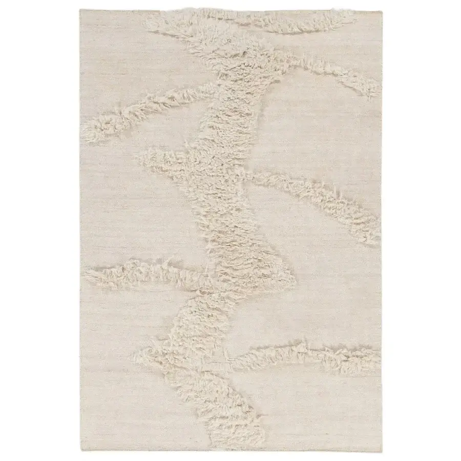 Exceptional Amini Il Volo rug hand-knotted in India with flowing abstract lines of ivory jute and New Zealand wool, presenting a refined finish