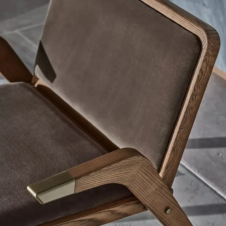 Elegant Bontempi Lady Lounge chair in plush textile upholstery with satin-finished wood and refined brass details