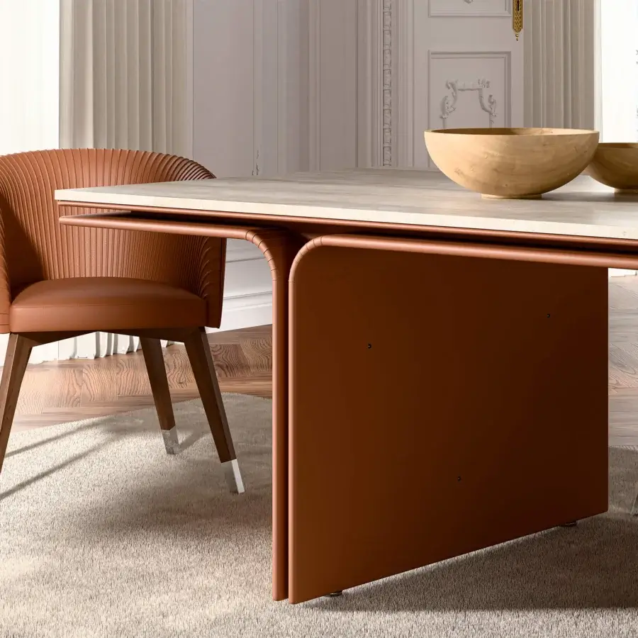 Distinguished Mascheroni Jazz Louis table built with Travertine and meticulously upholstered Mascheroni leather in a reddish-brown tone