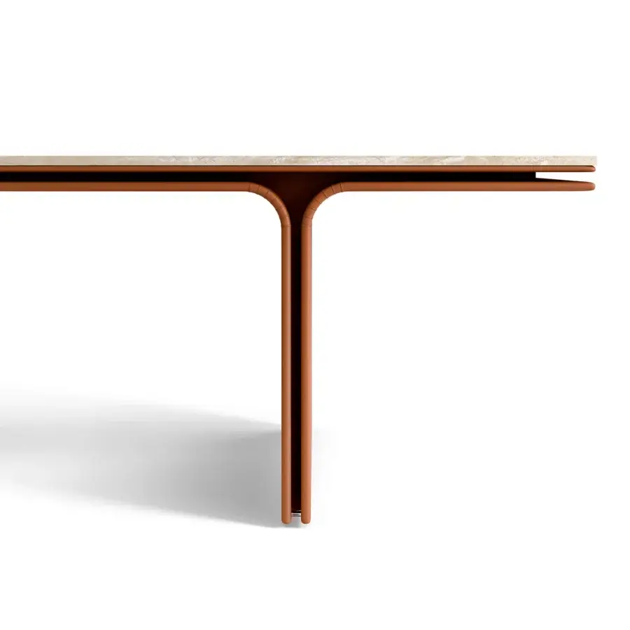 Distinguished Mascheroni Jazz Louis table with a Travertine top and skillfully bent steel base in a reddish-brown satin finish